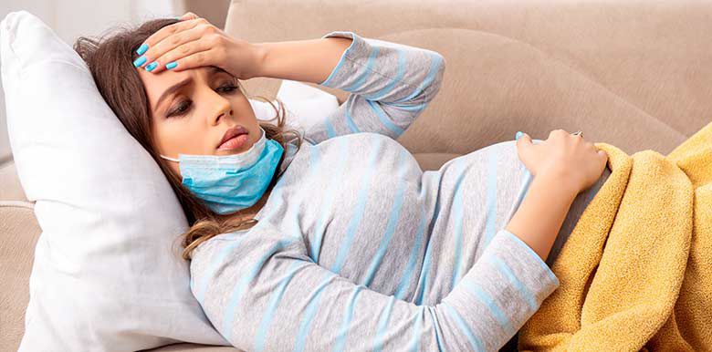 grossesse femme enceinte coronavirus co-vid 19 symptômes dangers